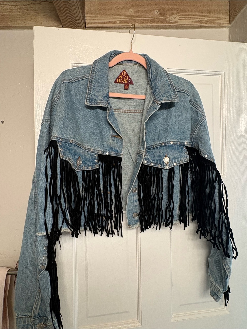 Light Wash Denim Jacket with Black Fringe Trim